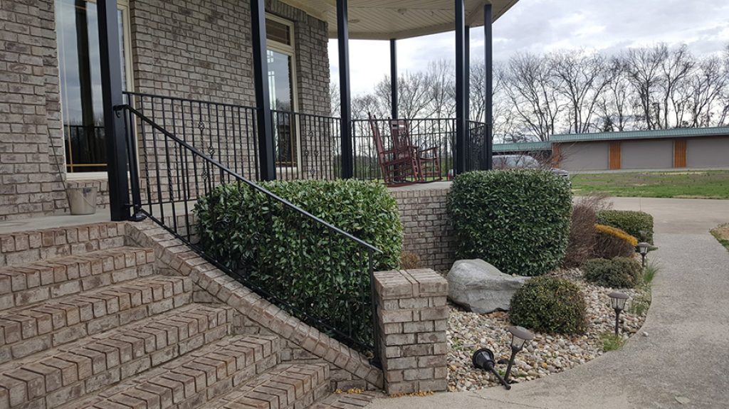 CA traditional home with new iron hand rail wrap around porch.jpg