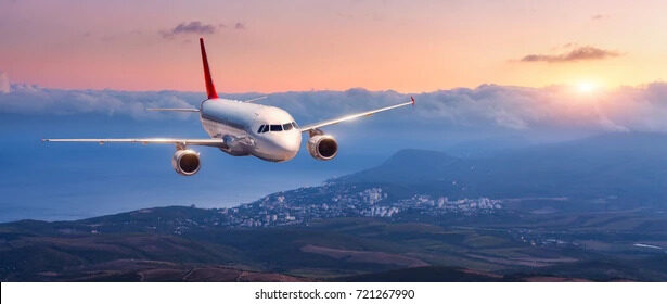 passenger-airplane-landscape-white-flying-260nw-721267990.jpg