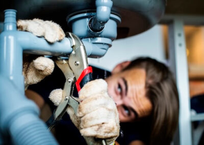 Licensed-Local-Plumber-Fixing-Kitchen-Sink.jpg