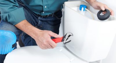 5a15d22d4593fa00011eadc7_plumber-fixing-toilet.jpg